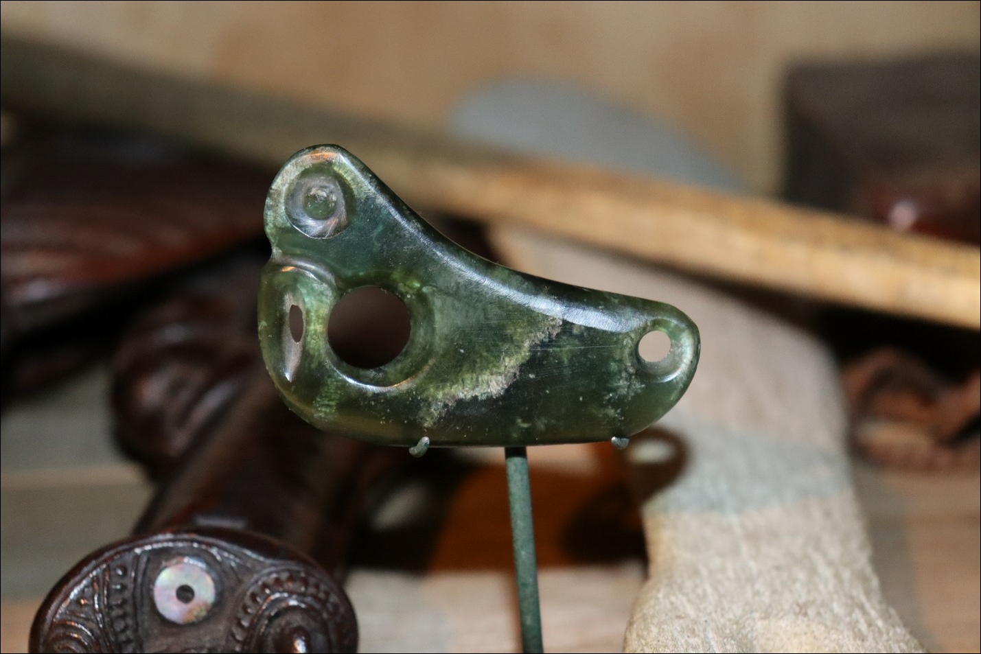 Maori greenstone kaka poria, Maori greenstone parrot ring, greenstone, antique maori pendant, nephrite, maori antique, maori antique, antique maori pounamu pendant, maori artifact, greenstone pekapeka, 19th century maori tiki, hei tiki, antuque maori, maori artifact, maori club, polynesian tribal art antiques and weapons gallery, oceanic tribal art antiques and weapons gallery, ethnographic tribal art antiques and weapons gallery, 19ème siècle Maoris massue de guerre, looking to buy tribal antiques art and weapons, buying Maori antiques, buying Maori clubs, artifacts and weapons, buying Maori antiques, buying Maori clubs and artifacts